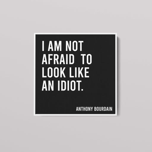 Minimalist canvas print with Anthony Bourdain quote about not being afraid.